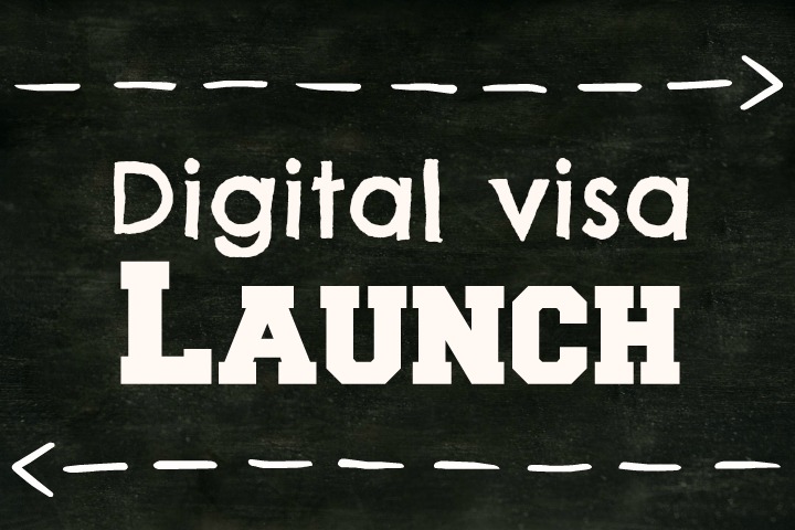 Chalkboard with words "Digital visa launch" on it.