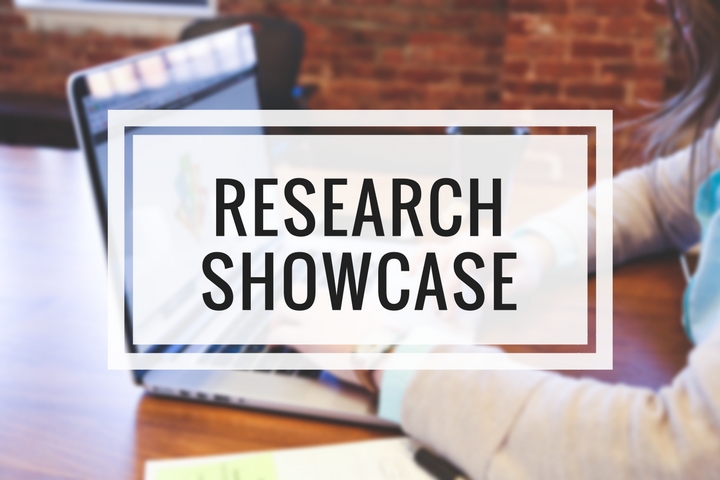 Text "Research showcase" over image of hands at keyboard of a laptop
